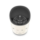 Open cream SMEG milk frother showing the non-stick interior, removable whisk attachment and fill level markings.