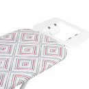 Close-up of the ironing board’s diamond-patterned cover and integrated iron rest platform for safe iron placement.