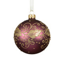 Burgundy glass Christmas bauble with gold glitter leaf and scrollwork pattern, finished with a gold cap and cream ribbon hanger for elegant festive tree decoration.