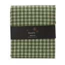 Folded sage green and white gingham tablecloth in retail packaging, featuring a timeless checked design suitable for everyday dining, entertaining and seasonal décor.