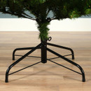 Green metal stand and trunk support for a pre-lit artificial Christmas tree, designed for secure indoor stability and easy seasonal setup.