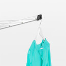 Rotary washing line arm with integrated hanger hook, ideal for drying delicate garments on clothes hangers.