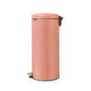 Brabantia NewIcon Pedal Bin 30L in Terracotta Pink placed in a stylish kitchen, complementing warm wood cabinetry and earthy-toned tiled surfaces.