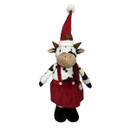 Festive cow Christmas decoration with black and white spotted design, wearing a red dress, striped scarf and tall Santa hat, ideal for seasonal home displays.