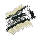 Set of candle-style Christmas tree lights with green clip attachments and mains plug, shown on a white background.