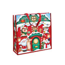Festive gift bag featuring Santa and a colourful Christmas grotto scene.