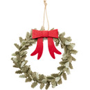 Decorative Christmas wreath made from layered holly leaves with a bright red felt bow and twine hanger, displayed on a light background.