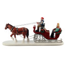 Side view of a festive horse and sleigh Christmas village accessory with seated couple, detailed harness, red sleigh and winter-themed decorations.
