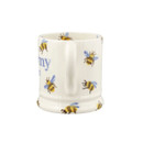 Side profile highlighting the mug handle and the all-over bumblebee pattern that continues around the mug.