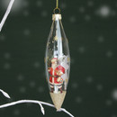Close-up of a clear elongated Christmas bauble with Father Christmas artwork, gold snowflake details and a sparkling gold glitter base.