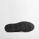 Black rubber lug sole with deep tread pattern.