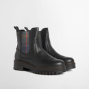 Pair of black leather Chelsea boots with tartan elastic side panels and chunky lug soles.