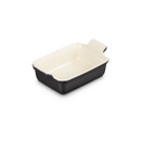 Angled top view of the rectangular stoneware baking dish highlighting the deep interior, satin black finish and integrated side handles.