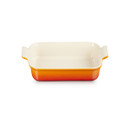 Rectangular stoneware baking dish in a Volcanic finish with integrated side handles, shown from a front angle.