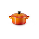 Le Creuset Volcanic stoneware mini round casserole dish with lid, shown from the front on a white background.