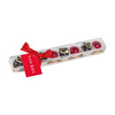 Jan Roy festive chocolate selection in a clear gift box with red ribbon, featuring Christmas pudding chocolates and glittery red bauble chocolates for seasonal gifting.