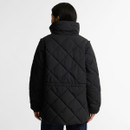 Rear view of the Barbour women's black quilted jacket showing the diamond quilted design and relaxed fit.