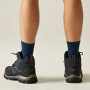 Rear and back-angle view of navy blue waterproof hiking boots showing supportive heel design, padded ankle collars and durable lugged outsoles.