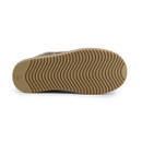 Sole view of a leopard print mule slipper showing the lightweight outsole with textured wave-pattern tread for reliable indoor grip.