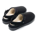Pair of black adjustable slingback mule slippers with plush faux fur lining, faux suede uppers and adjustable heel straps.