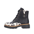 Outer side profile of the Rieker black lace-up ankle boot with cow print pony hair panels, inside zip and chunky lug sole.