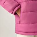 Close-up of zipped hand pocket on children's pink padded jacket.