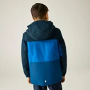 Rear view of child wearing a navy and blue hooded waterproof jacket.