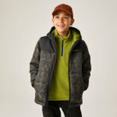 Front lifestyle image of the junior insulated hooded jacket worn open, showcasing the camouflage print, padded hood, quilted insulation, and layered outdoor styling.