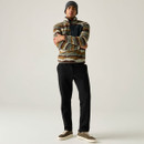 Full-length view of a model wearing the Regatta men's Frankie Borg fleece in Ground Coffee Mountain print with a grey beanie.