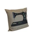 Angled view of a sewing-themed decorative cushion with a vintage sewing machine print and "Love You Sew Much" slogan, ideal as a gift for sewing lovers.