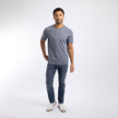 Full-length view of the Weird Fish men's marl blue T-shirt paired with blue jeans and trainers for an easy casual outfit.
