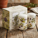 Set of fine china salt and pepper shakers featuring a colourful olive branch design, displayed beside their coordinating gift box on a rustic wooden table.
