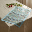 William Morris Strawberry Thief tea towel featuring the iconic bird, strawberry and floral pattern on a soft blue background with matching blue trim. Displayed on a linen-covered table alongside fresh strawberries and herbs.