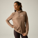 Rear view of a woman wearing a Regatta women's mocha quarter zip fleece, showing the longer length and high collar.