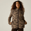 Woman wearing a Regatta women's zebra print borg fleece jacket with full zip fastening, high collar and side pockets.