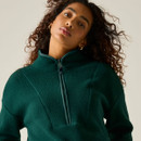Close-up of a woman wearing a Regatta women's deep pine longline borg fleece with the half zip fastened.