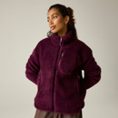 Model wearing the Regatta women's fig borg fleece jacket with a full-length zip, high collar and zipped chest pocket.