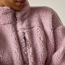 Close-up of the Regatta women's powder lilac borg fleece jacket showing the high collar, zipped chest pocket and soft borg fabri