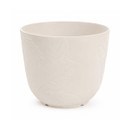 Eggshell round planter with an embossed tropical leaf pattern, isolated on a white background.