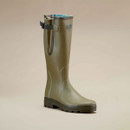 Three-quarter view of a Le Chameau green Wellington boot with adjustable calf gusset, buckle strap and checked lining.