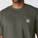 Close-up of a dark grey-green Carhartt T-shirt showing the ribbed crew neckline, chest pocket and signature logo patch.