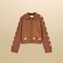 Brown collared button-through cardigan with pink and red floral detailing along the sleeves and hem, finished with ribbed trims.