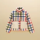 Front view showcasing the cream borg fleece, colourful check pattern and oversized contrast patch pockets.