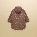 Back view showcasing the all-over equestrian print, hooded silhouette, Joules branding and adjustable sleeve tabs.