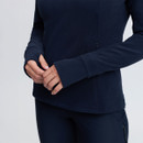 Close-up of the navy LeMieux women’s fleece showing fitted shaping, concealed side zip pocket and extended sleeve cuffs.