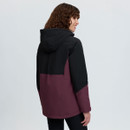 Rear three-quarter view of a woman wearing a black and plum LeMieux hooded jacket, showing the two-tone back design.