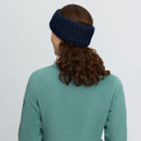 Rear view of a navy LeMieux knitted headband, showing the wide ribbed design and textured finish.