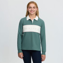 Front studio view of a green LeMieux equestrian polo top with white collar, white logo chest panel and pale pink piping, paired with navy riding leggings.
