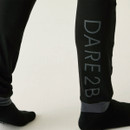 Black leggings with a grey "DARE2B" logo on the left leg.