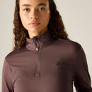 A model wearing a brown, zip-neck long-sleeve top with a small black logo on the chest from Dare 2b.